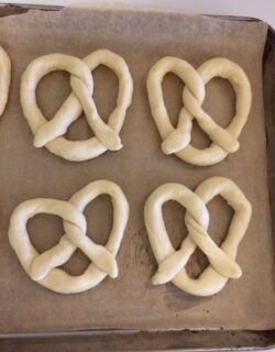 4 pretzel twists on parchment paper