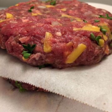 hamburger patty on parchment paper