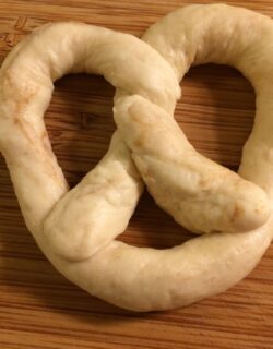 formed pretzel dough with shorter rope
