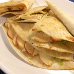 honey chicken apple quesadilla cut into triangles