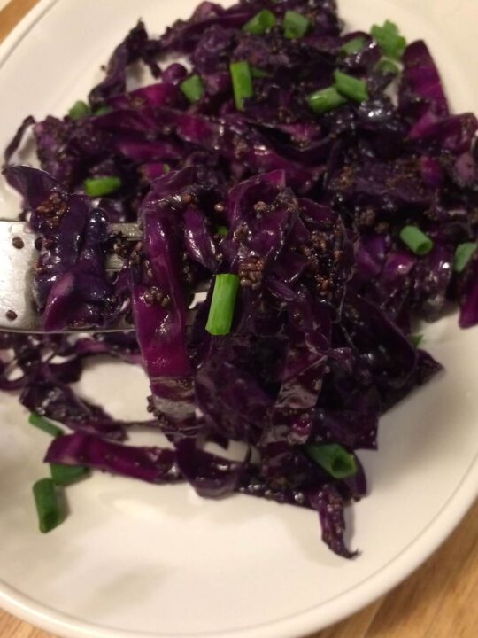 sautéed cabbage with chia seeds on fork