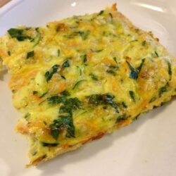 Veggie frittata square portion on white plate