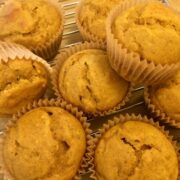 butternut squash muffins stacked on cooling rack