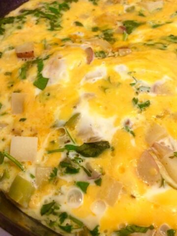 mexican frittata in cast iron pan close up