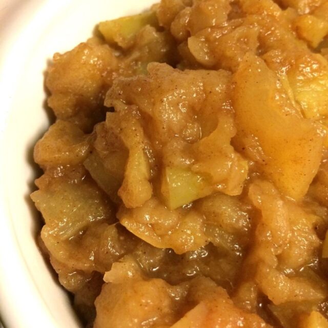 chunky applesauce in white CorningWare bowl