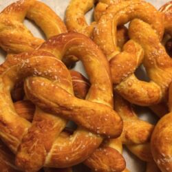 homemade soft pretzels stacked with salt