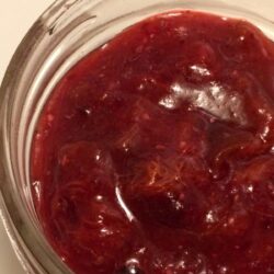 naturally sweetened plum jam in mason jar close up