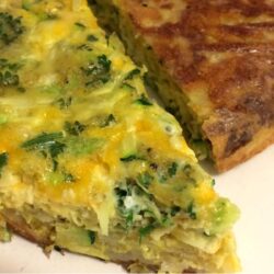 egg frittata face up and face down with hash brown bottoms showing