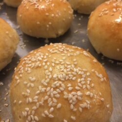 soft burger buns with sesame seeds on top