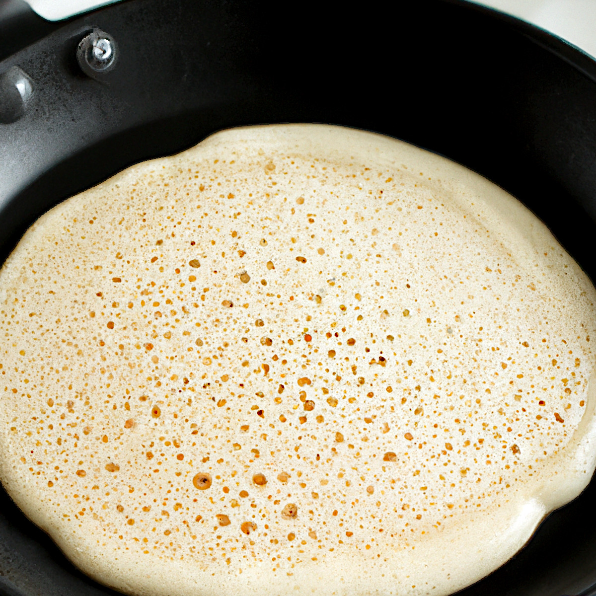 pancake batter in a pan