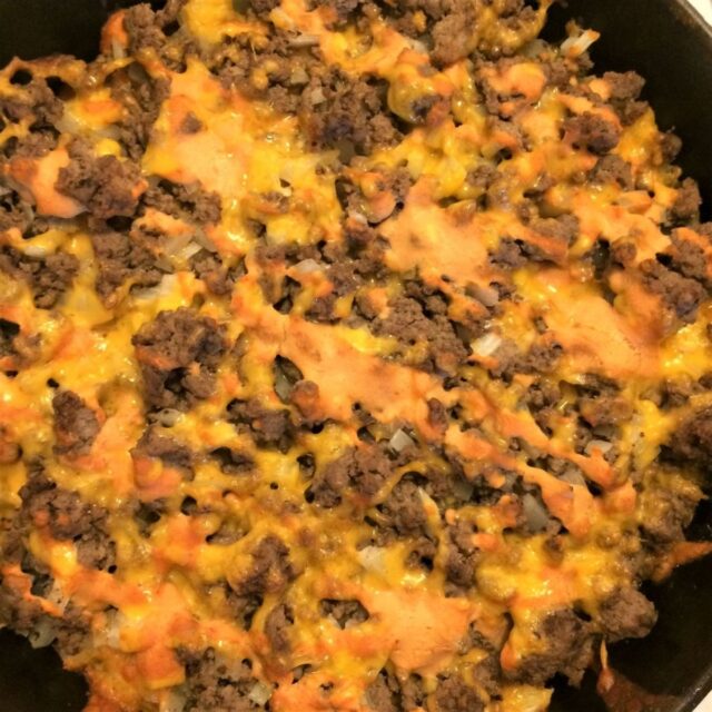 cheeseburger skillet pizza baked and complete in cast iron skillet