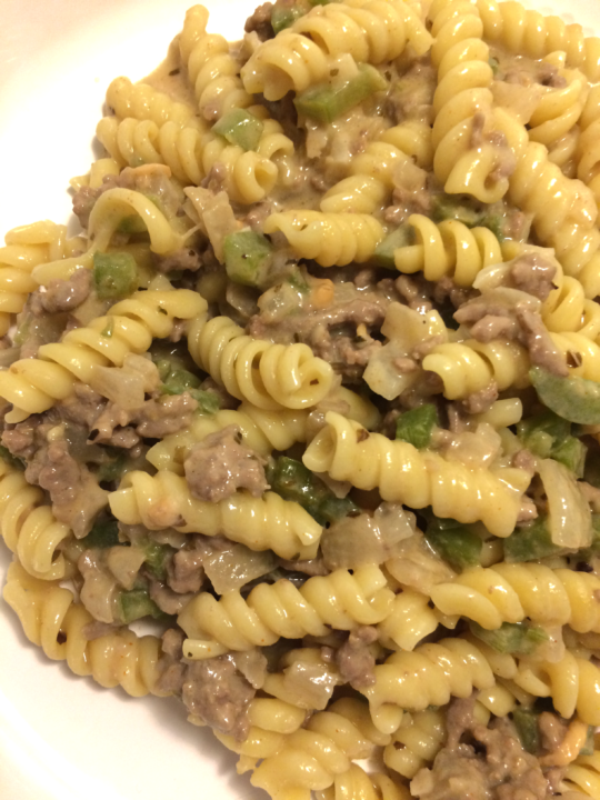 creamy beef rotini complete dish on white plate