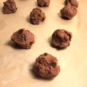 double chocolate chip cookie dough balls on parchment paper