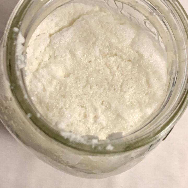 Bird's eye view of blended rice and milk soaking in a large mason jar